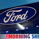 A photo of the Ford blue oval logo on the side of a building.